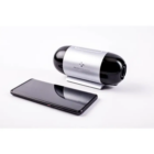 Image of a Luna TravelPAP being shown off as roughly the same length an width as a cell phone